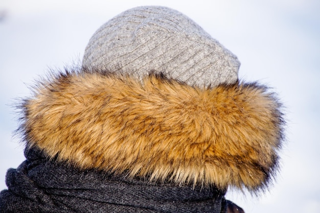 Photo close-up of person wearing fur hat