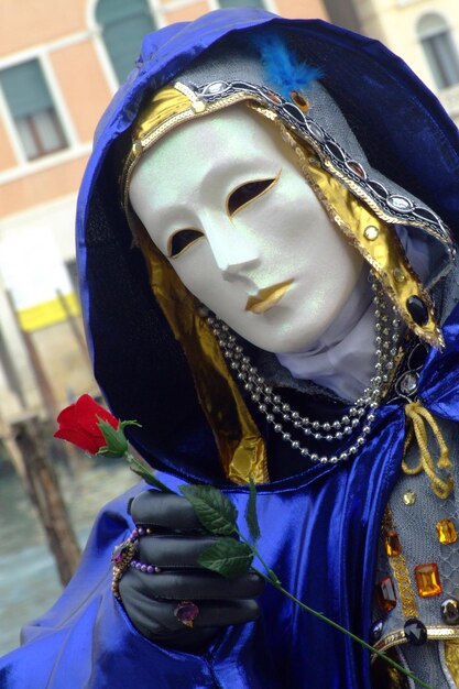 Close-up of person wearing mask and costume