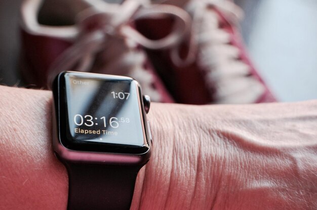 close-up of person wearing smart watch