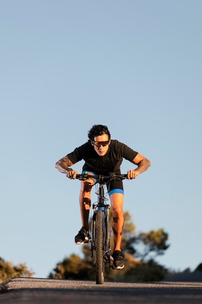 Photo close up on person with electric bike