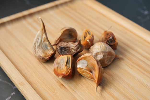 Close up pf black garlic on white background table