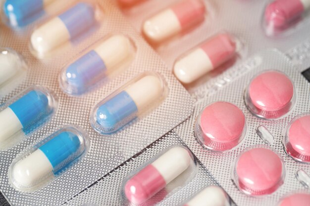 close up pharmaceuticals antibiotics pills medicine in blister packs colorful antibacterials pills Pharmacy background capsule pill medicine Antimicrobial drug resistance Pharmaceutical industry