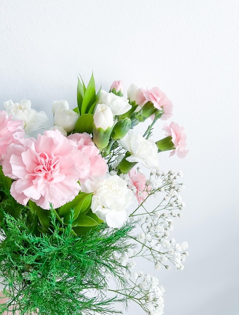 Close up photo of a bouquet of pink carnations