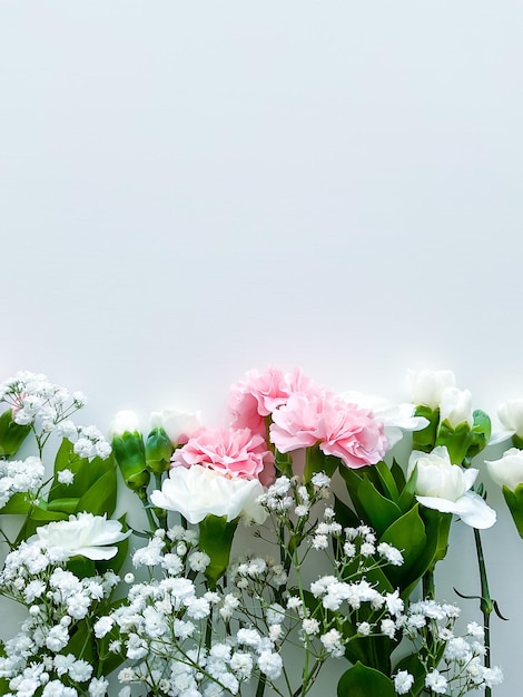 Close up photo of a bouquet of pink and white