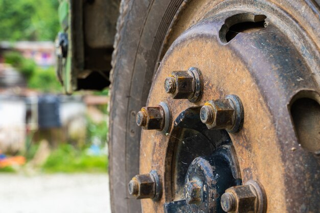 Close up photo of bus or truck front wheel. Transportation concept, stock photo.