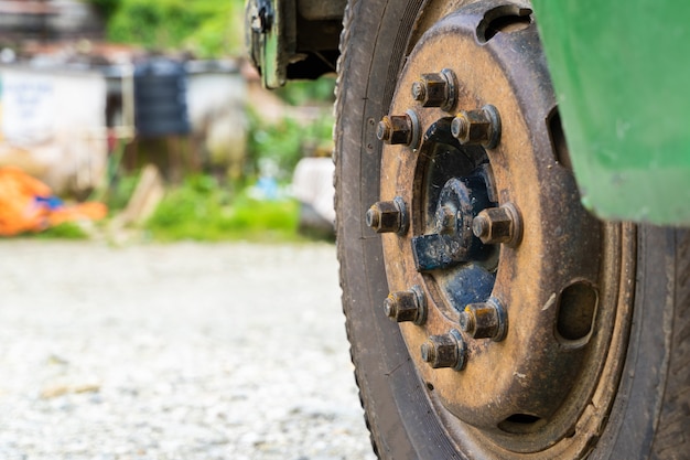 Close up photo of bus or truck front wheel. Transportation concept, stock photo.