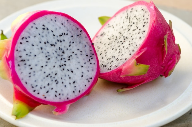 Close-up photo of dragon fruit (pitahaya) on a plate.