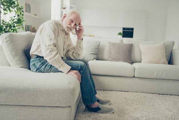 Close-up photo of grey haired grandfather