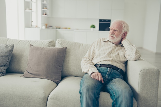 Close-up photo of grey haired grandfather