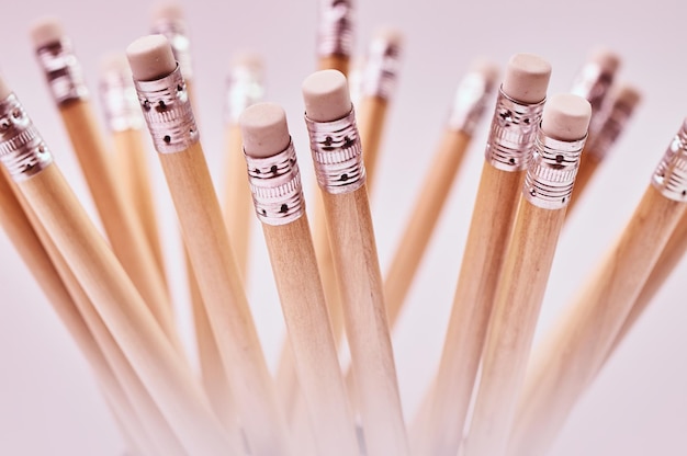 Close-up photo of a group of pencils. Isolated on a gray background.