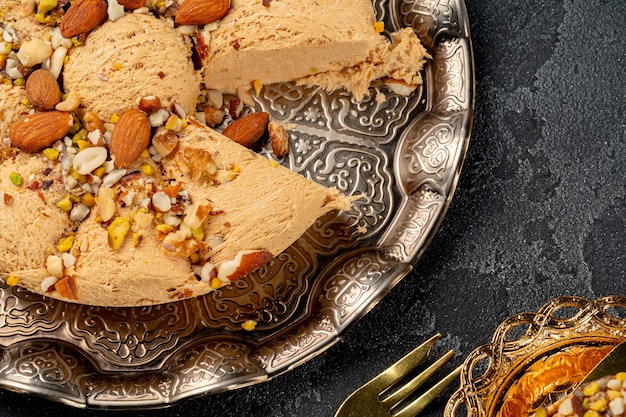 Close up photo of halva dessert on silver plate