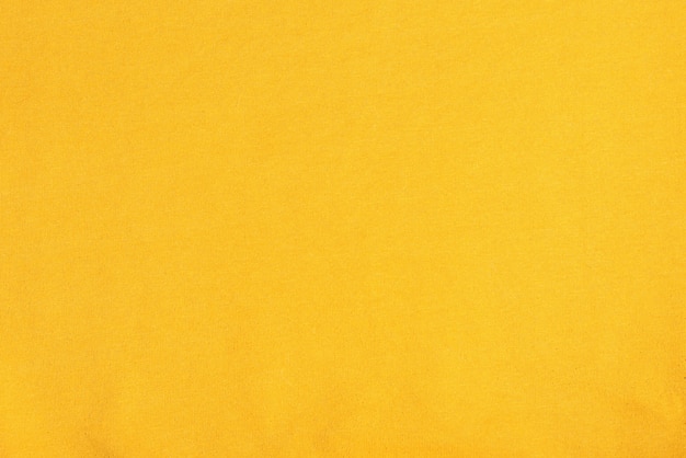 Close up photo of light yellow cloth texture