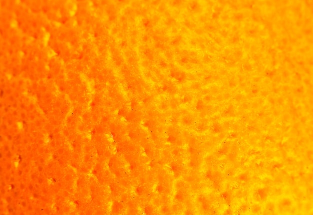 오렌지 껍질 질감의 사진을 닫습니다. 오렌지 익은 과일 배경, 매크로 보기. 인간의 피부 문제 개념, 여드름 및 셀룰라이트. 아름다운 자연 벽지.
