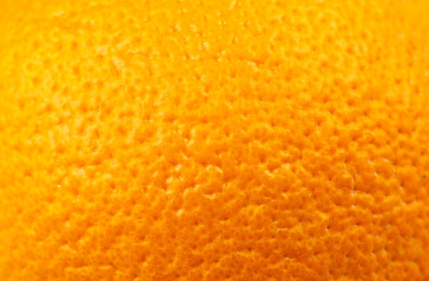 Foto close up foto di buccia d'arancia texture. arance frutta matura sfondo, vista macro. concetto di problema della pelle umana, acne e cellulite.