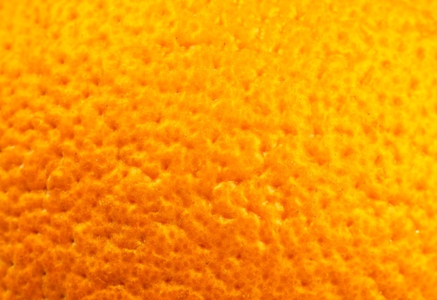 오렌지 껍질 질감의 사진을 닫습니다. 오렌지 익은 과일 배경, 매크로 보기. 인간의 피부 문제 개념, 여드름 및 셀룰라이트.