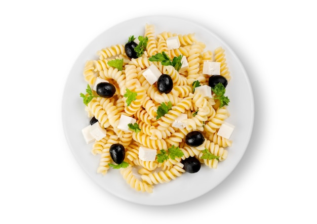 Close-up photo of pasta with olives and cheese in white plate