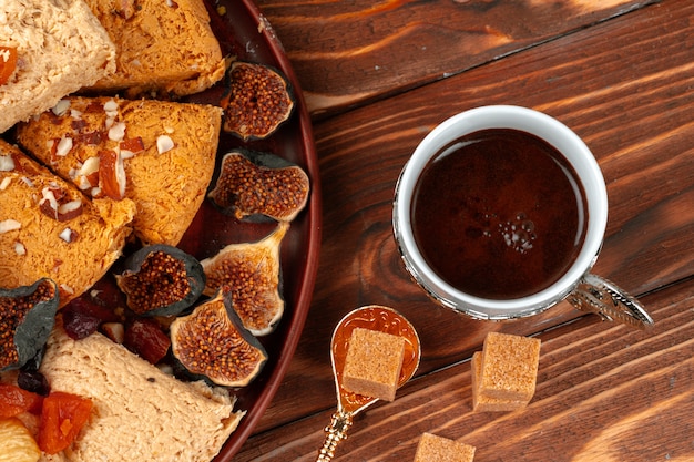 Close up photo of turkish national desserts with cup of coffee