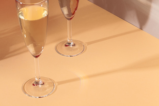 Close up photo of two champagne glasses