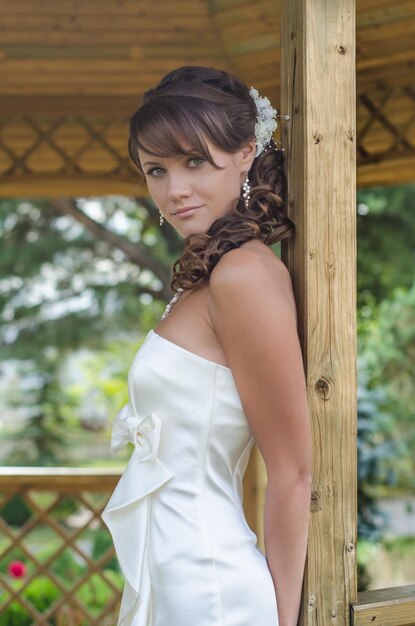 Close up photo of a young smiling bride