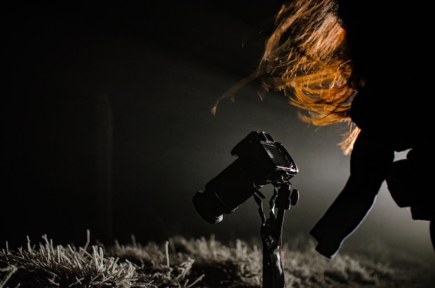 Photo close-up of photographer at night