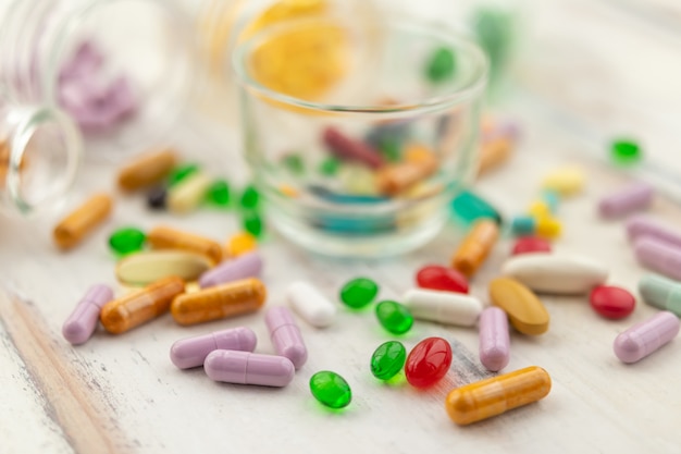 Close-up photos of capsules and vitamins