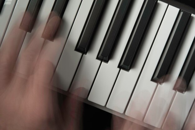 Close-up of piano hanging