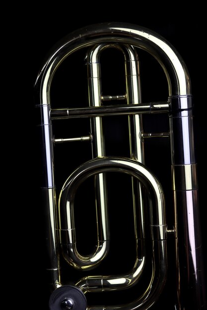 Photo close-up of piano keys against black background