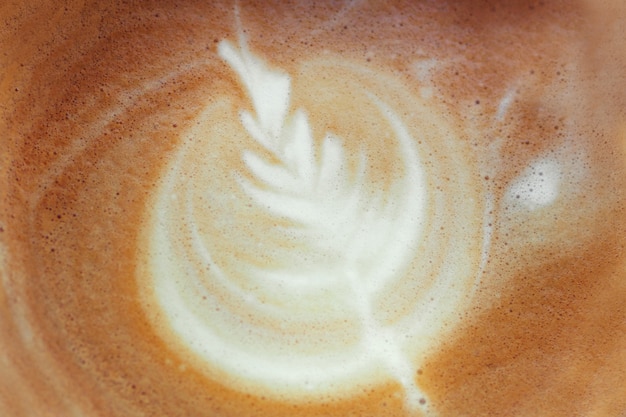 Foto foto di close-up di caffè. latte art, rosetta, cappuccino al caffè