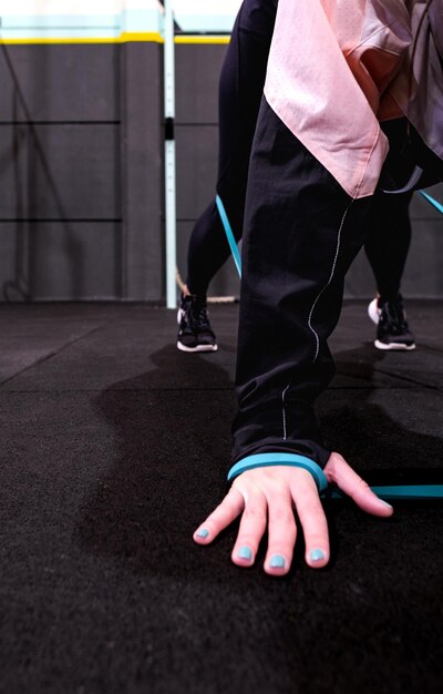 A close up picture of elastic bands used by a woman while training