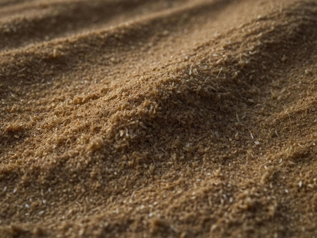 a close up of a pile of brown dirt