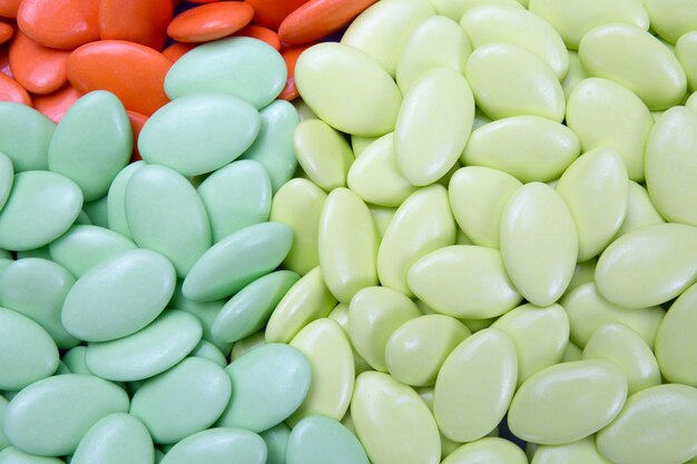 Close up of a pile of colorful chocolate coated candy