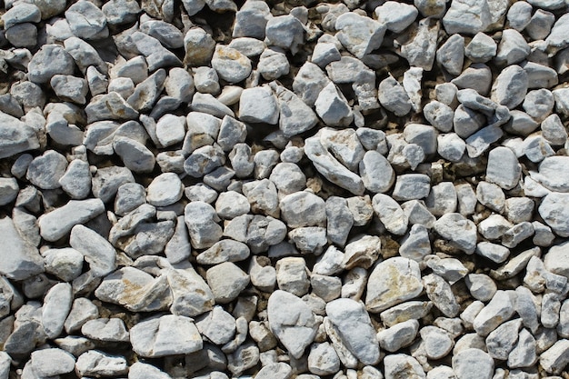 a close up of a pile of gray rocks