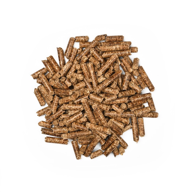 Close up pile of hardwood pellets for natural food smoking and cooking, isolated on white background