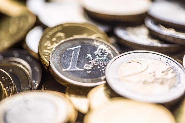 Close-up a pile of new euro coins in other compositions.