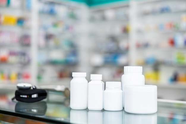 Photo close-up of pill bottles on checkout at store