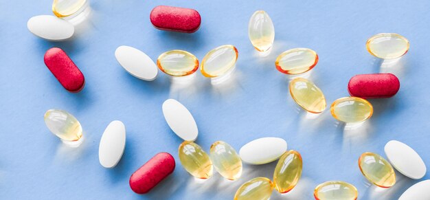 Close-up of pills on white background