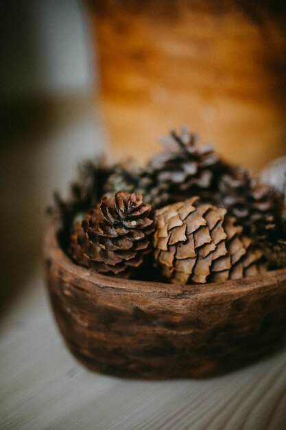 close-up of pine cone on table
