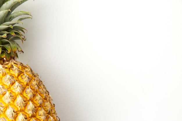 Close-up of pineapple over white background