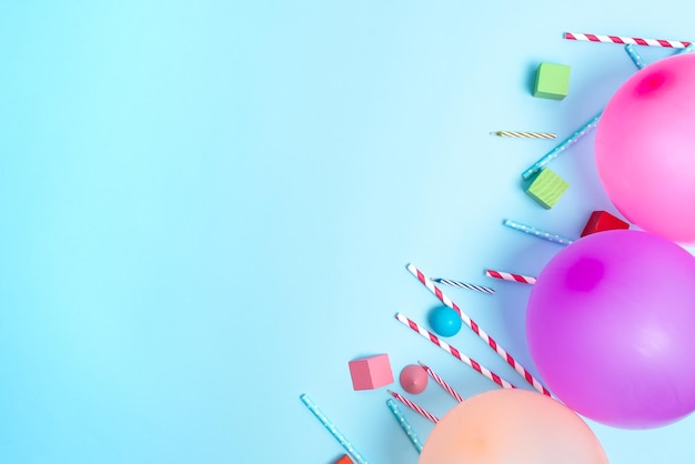Close-up of pink balloons against blue background