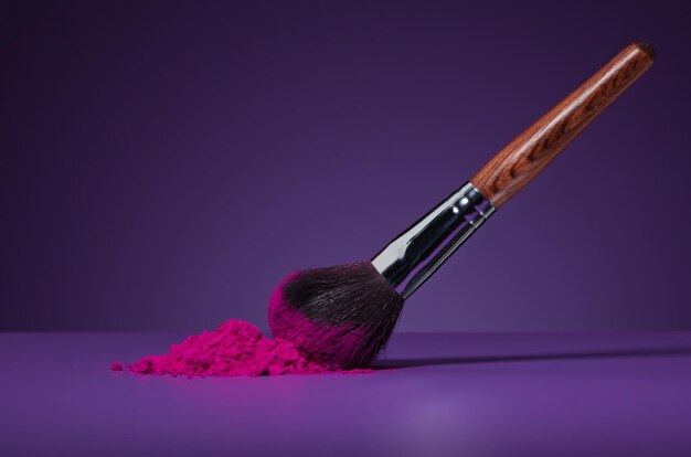 Close-up of pink flower on table against gray background