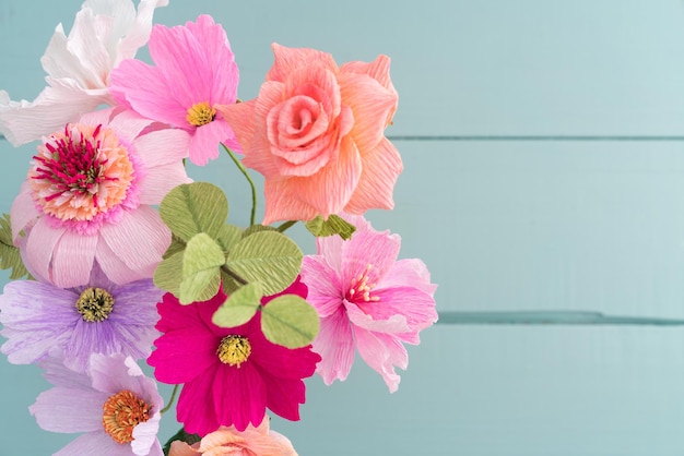 Close-up of pink flowering plant against wall