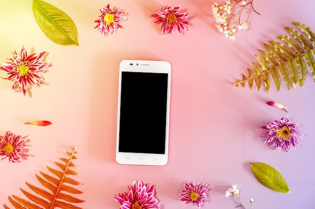 Photo close-up of pink flowers on table