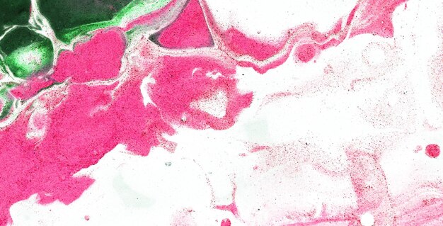 A close up of a pink and green painting with the word love on it.