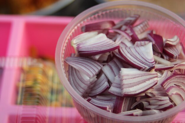 Close-up of pink jar on table