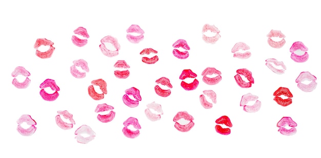 Photo close-up of pink lipstick kiss against white background