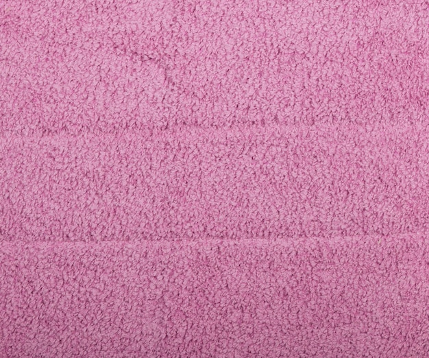 Close up pink microfiber washcloth household cleaning wipe or towel background texture