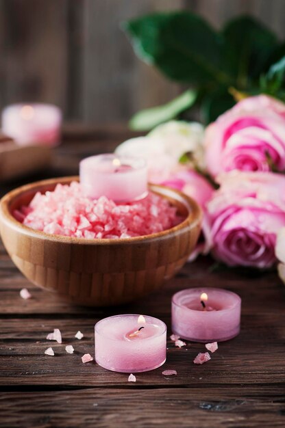 Close-up of pink roses on table