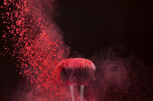 Close-up of pink splashing against black background