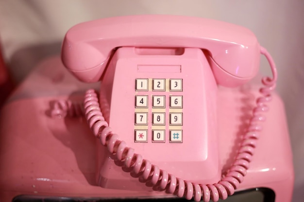 Close-up of pink telephone