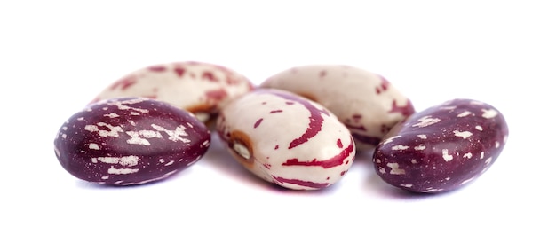 Close-up pinto beans isolated on white. Food